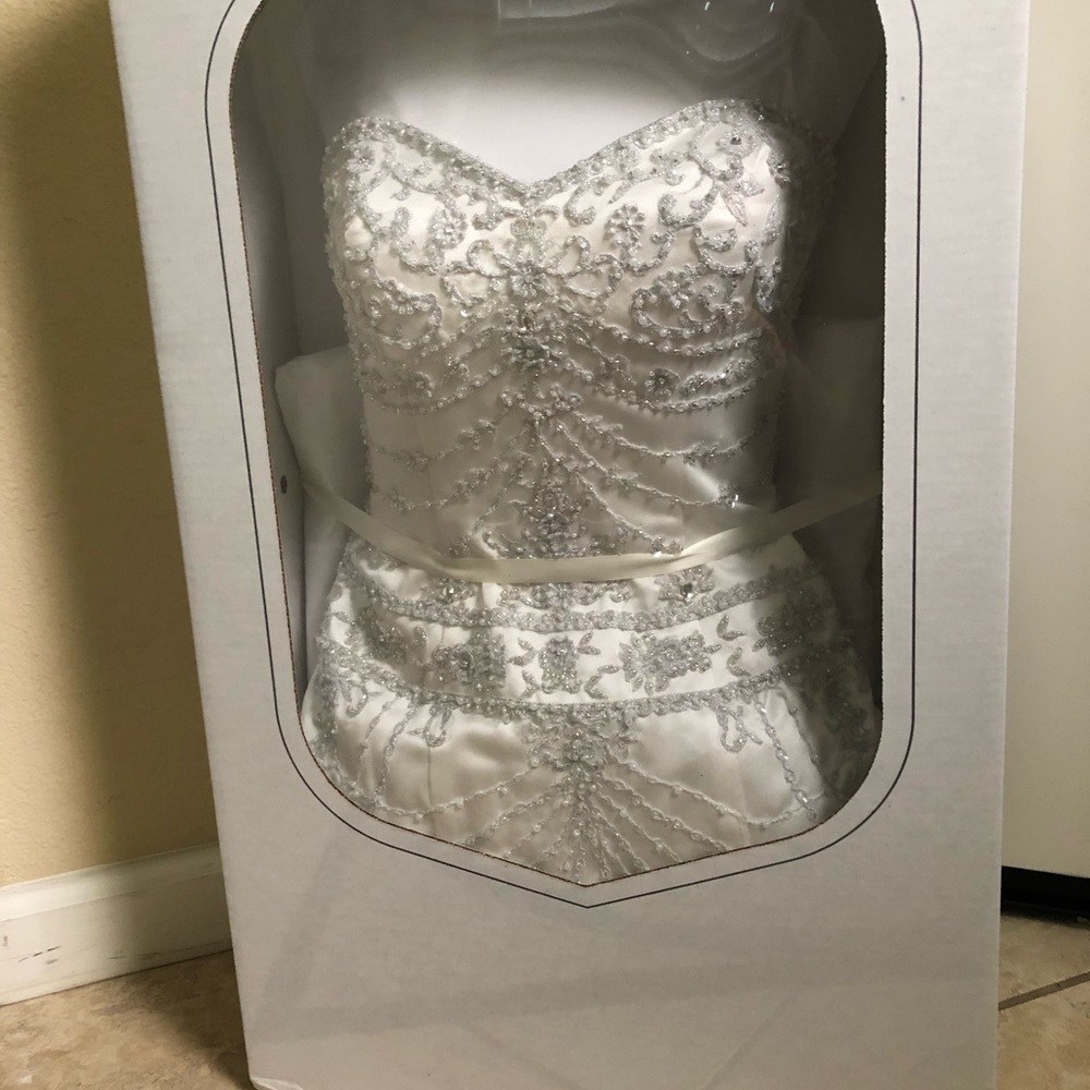 White, bejeweled wedding dress